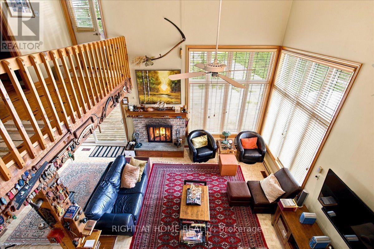 12 James Street, Tiny, ON - Indoor With Fireplace