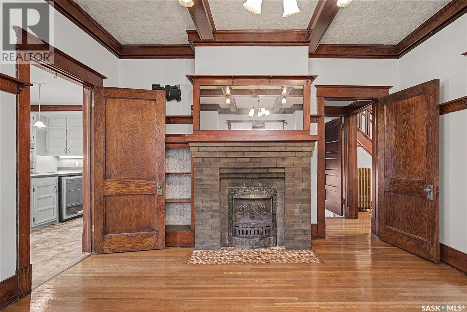 1037 Chestnut Avenue, Moose Jaw, SK - Indoor With Fireplace