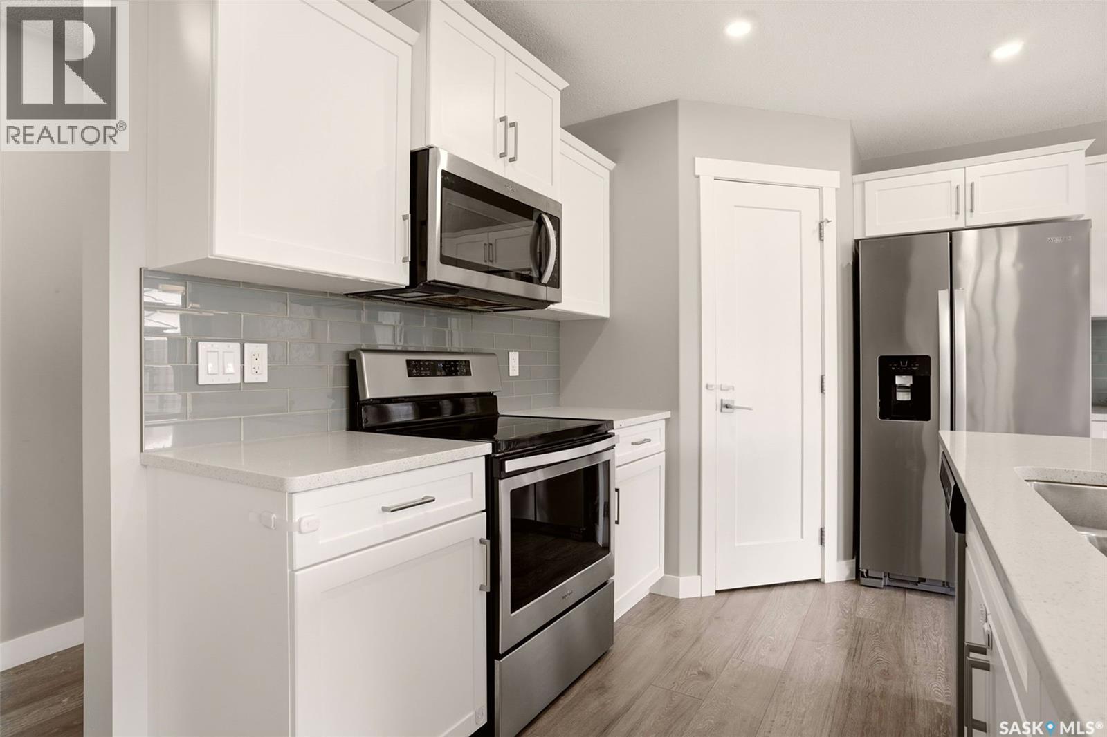 1760 Mustard Street, Regina, SK - Indoor Photo Showing Kitchen With Stainless Steel Kitchen With Upgraded Kitchen
