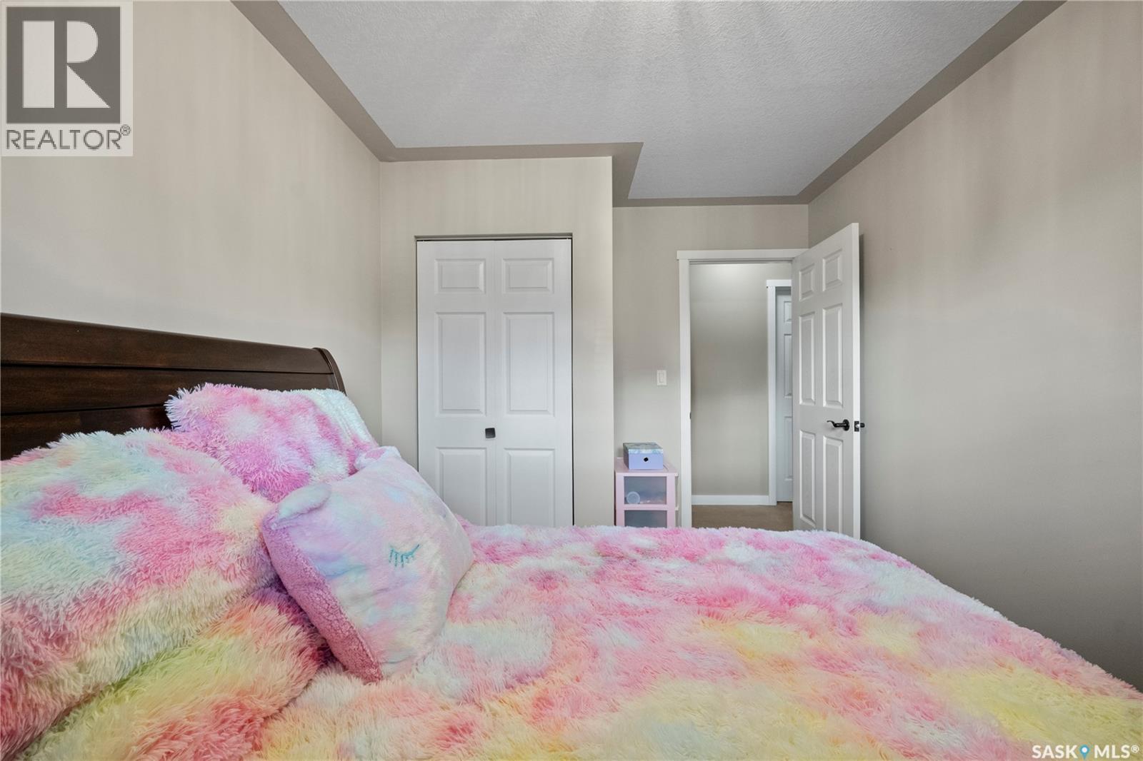 405 4Th Avenue Ne, Moose Jaw, SK - Indoor Photo Showing Bedroom