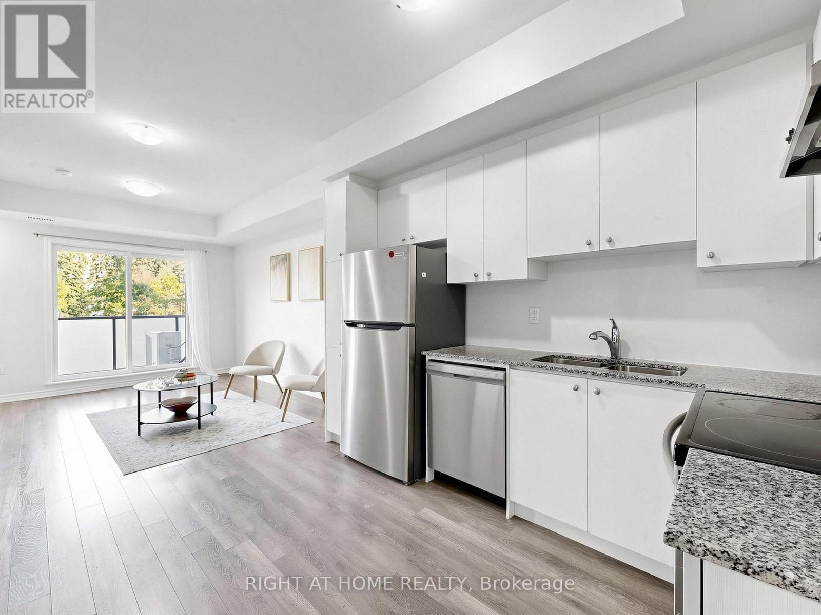 129 - 1081 Danforth Road, Toronto, ON - Indoor Photo Showing Kitchen With Stainless Steel Kitchen