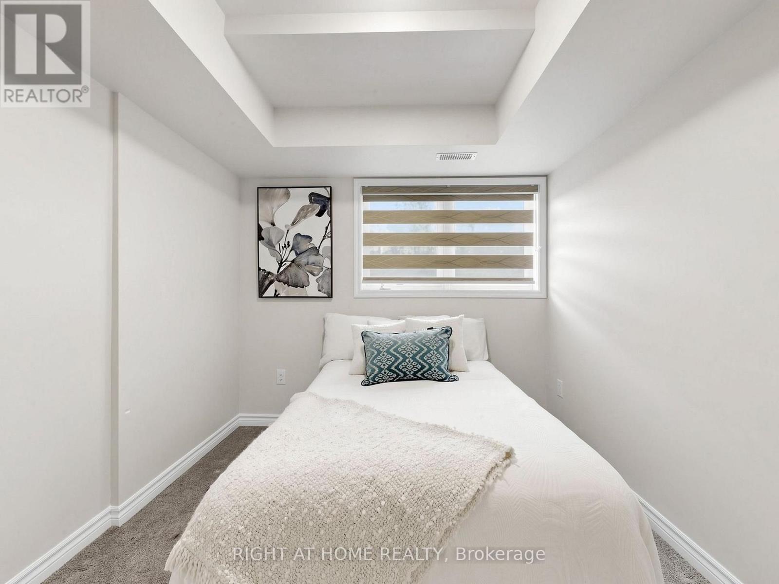 129 - 1081 Danforth Road, Toronto, ON - Indoor Photo Showing Bedroom