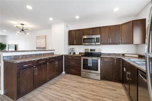 262 Rutland Street, Winnipeg, MB - Indoor Photo Showing Kitchen With Double Sink