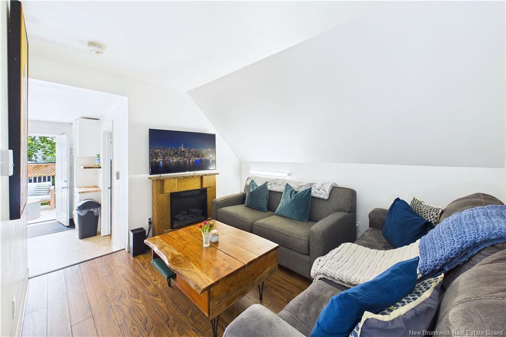 A & B-127 Cornhill St, Moncton, NB - Indoor Photo Showing Living Room With Fireplace