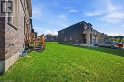 Expansive green lawn providing outdoor space - 
