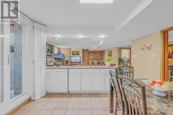 Walk out to backyard from bsmt kitchen - 