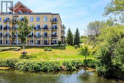Corner Unit Provides Panoramic Views of Lake - 