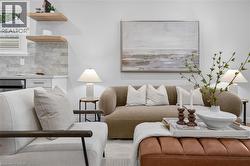 Bright interior with wood-finish floating shelves, white cabinetry, and a subway tile backsplash -