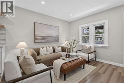 Wood-finish flooring, recessed lighting, and dual windows -
