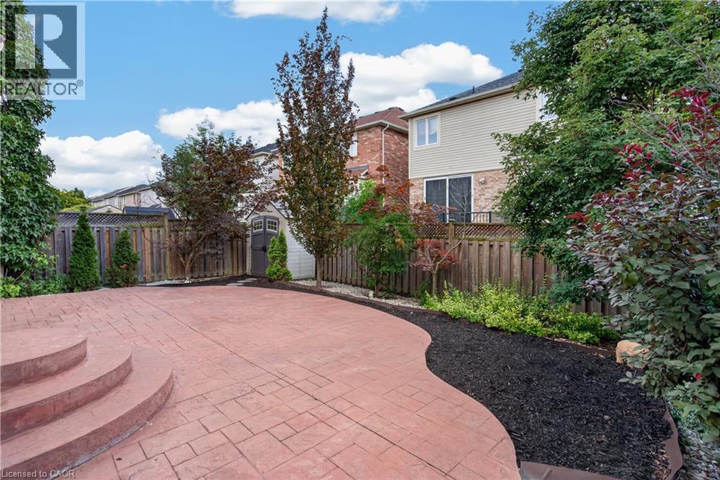 Stamped Rear Patio - 755 Rayner Court, Milton, ON