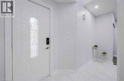 White entry door with decorative glass insert - 
