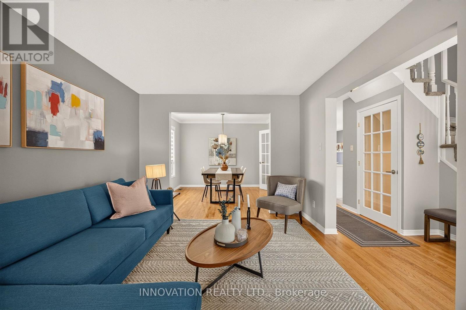 Living room - view of door to lower level at right - 2545 Page Road, Ottawa, ON