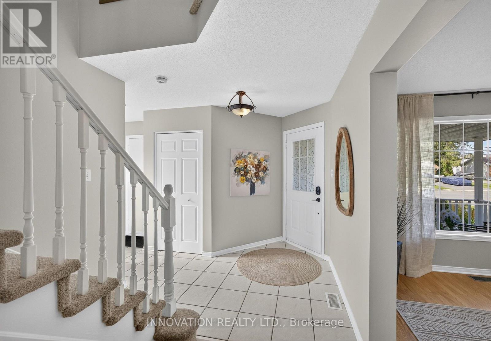 Foyer with view of inside-entry to garage at left - 2545 Page Road, Ottawa, ON