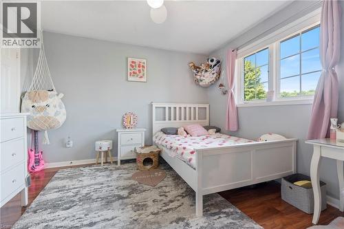 Hardwood-finish flooring, white trim, and light grey walls - 260 Granite Hill Road, Cambridge, ON 