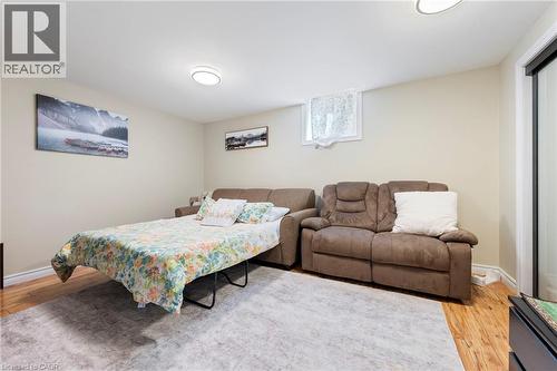 Hardwood-finish flooring, recessed lighting, and a window with natural light - 260 Granite Hill Road, Cambridge, ON 