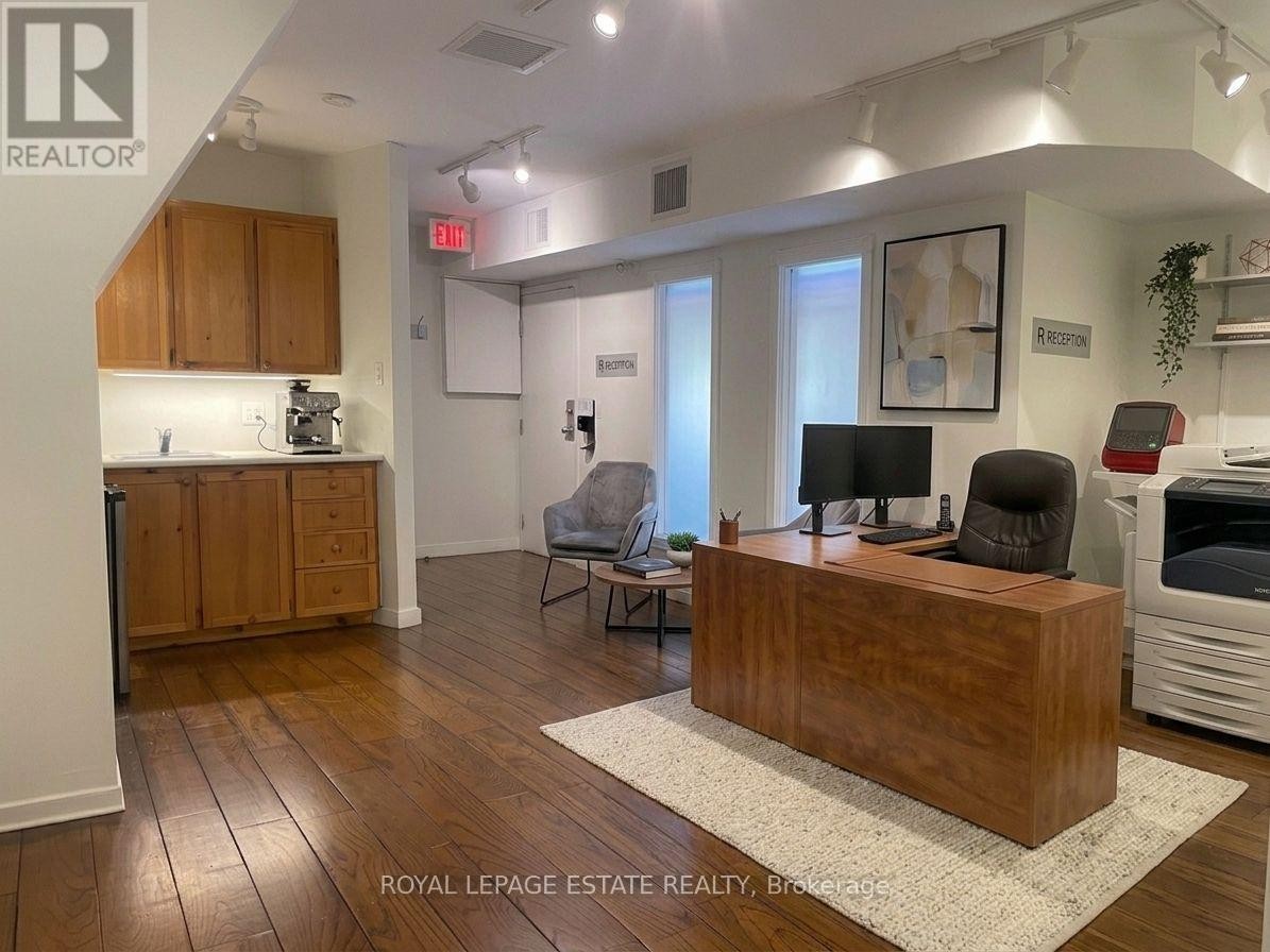 Virtually Staged Reception and Kitchenette - 307A Danforth Avenue, Toronto, ON
