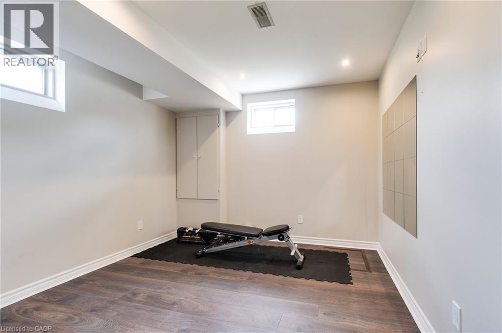 Recessed lighting and wood-finish flooring - 2 Hawstone Road, Vellore, ON