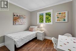 3rd Bedroom with Crown Molding O/L Backyard - 