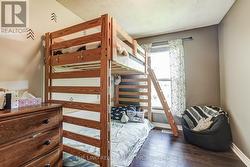 2nd bedroom with large window - 