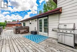 Main floor walkout with hot tub - 