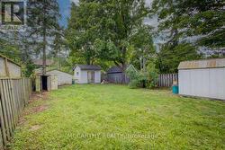 4 different sheds in back yard - 