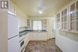 Kitchen with eat in space - 