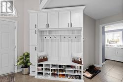 Custom built storage in foyer/entrance - 