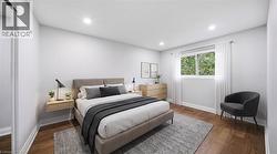 Recessed lighting, wood-finish flooring, and a large window with white trim - 