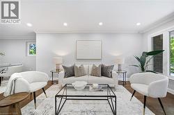 Recessed lighting throughout, crown molding, large window, wood-finish flooring - 