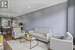 *Digitally removed play area, staged with seating* - 