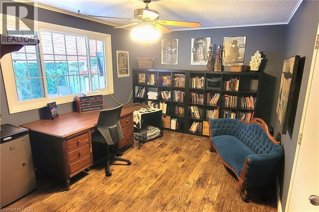 Dedicated home office with garage access. Can easily be converted to mudroom for needs of a larger family. - 115 Southwood Drive, Cambridge, ON