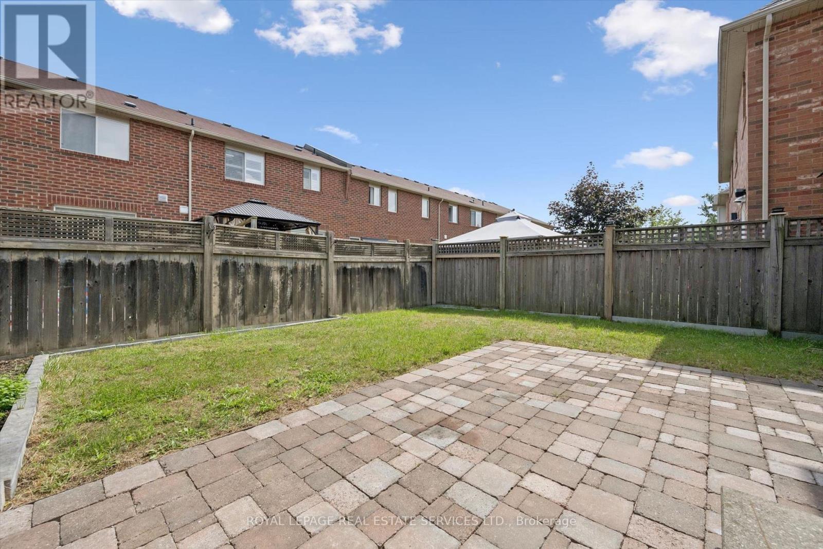 Spacious Backyard w Stone Patio - 937 Vickerman Way, Milton, ON