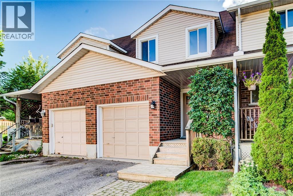 Brick and siding exterior with a shingle roof - 360 Cornridge Place Unit# 2, Waterloo, ON