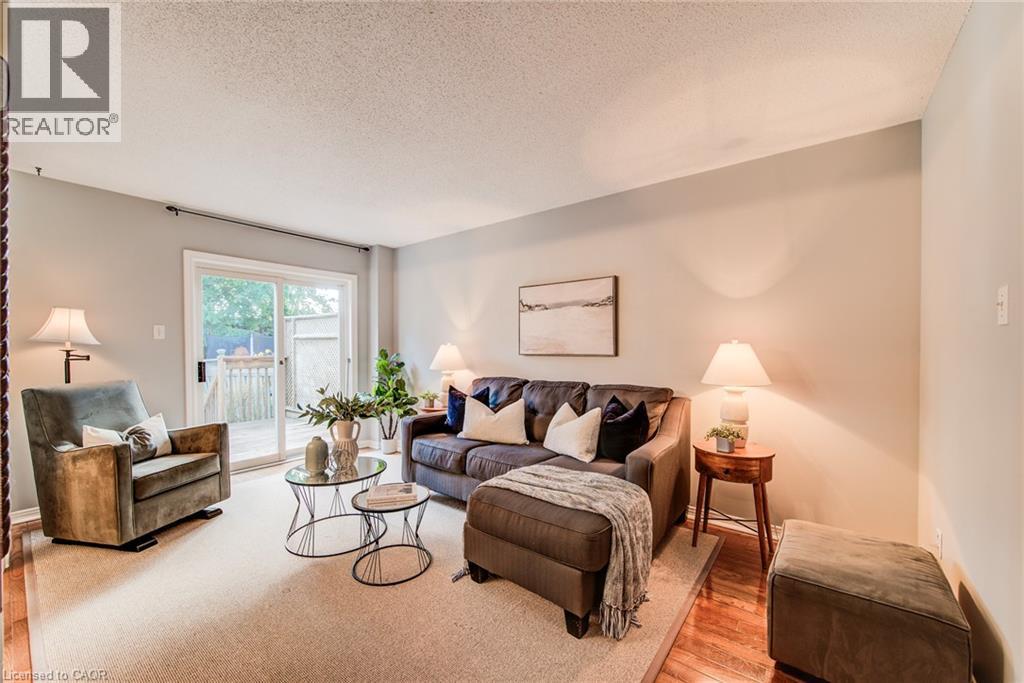 Recessed lighting, light-toned wall paint, and wood-finish flooring - 360 Cornridge Place Unit# 2, Waterloo, ON