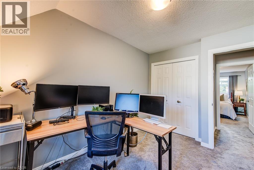 Sloped ceiling architecture with neutral wall paint - 360 Cornridge Place Unit# 2, Waterloo, ON