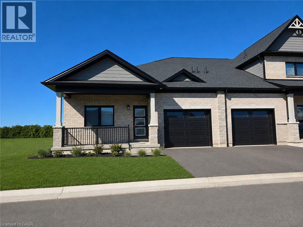 AI-enhanced image for illustration purposes. Depicts an existing Sparrow home. Actual home to be built, landscaping, surroundings, colours and finishes may vary. - 121 Barn Owl Way, Simcoe, ON