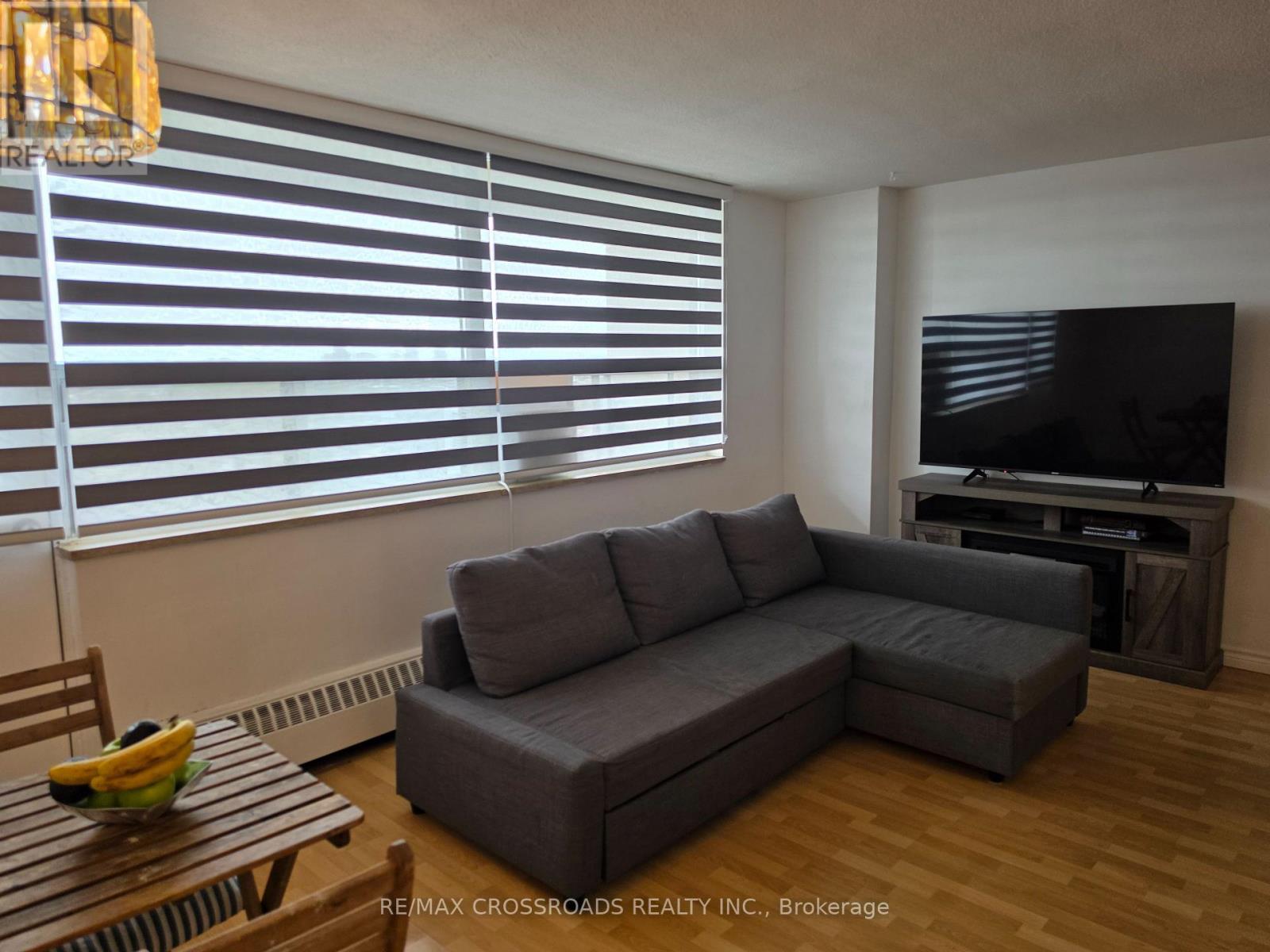 Living Room with Large Windows - 1004 - 5 Frith Road, Toronto, ON