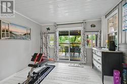 Enclosed 3 Season Sunroom with Deck Access - 