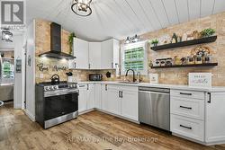 Renovated Kitchen with Stainless Steel Appliances - 