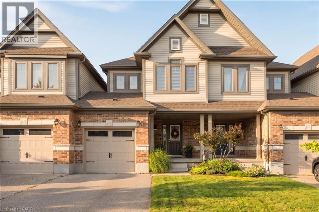 Brick and siding exterior with multiple windows - 187 Eden Oak Trail, Kitchener, ON
