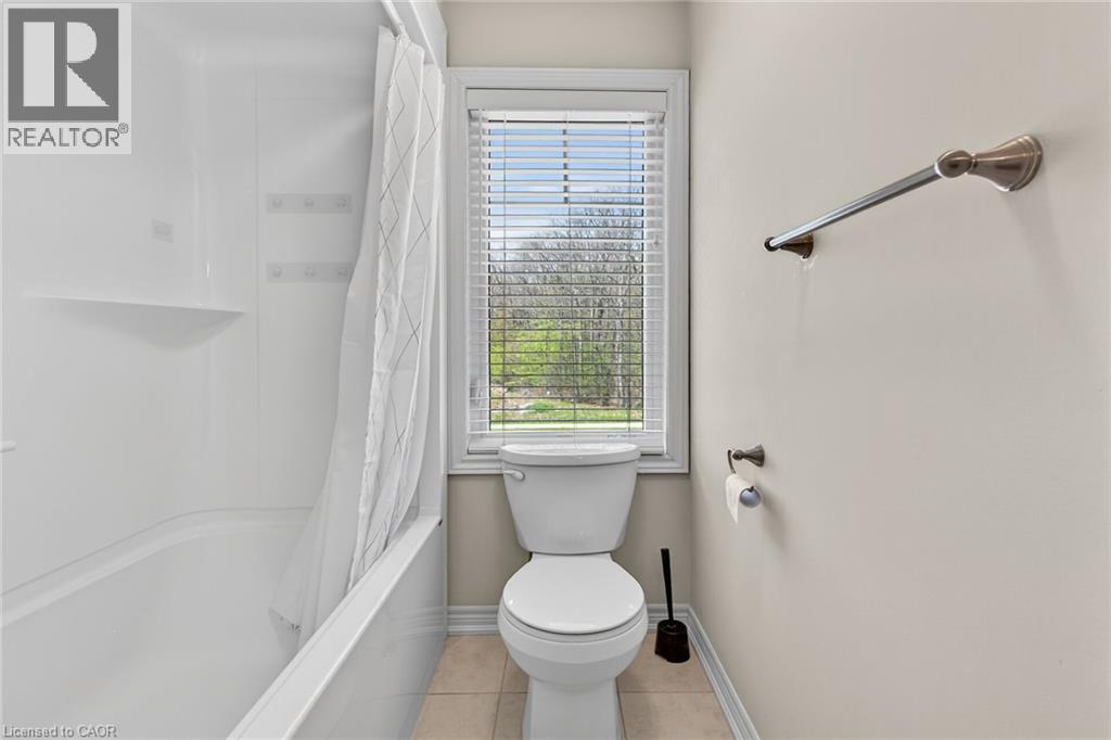 White bathtub with integrated shelving - 9 Winterberry Boulevard, Thorold, ON