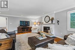 Curl up and unwind in front of a cozy fire! - 