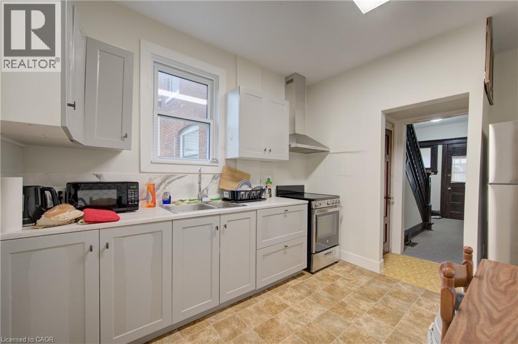 modern kitchen with stainless steel appliances - 24 Hunt Street, Hamilton, ON