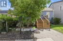 Big tree covering window for privacy. - 128 Robert Street, Hamilton, ON 