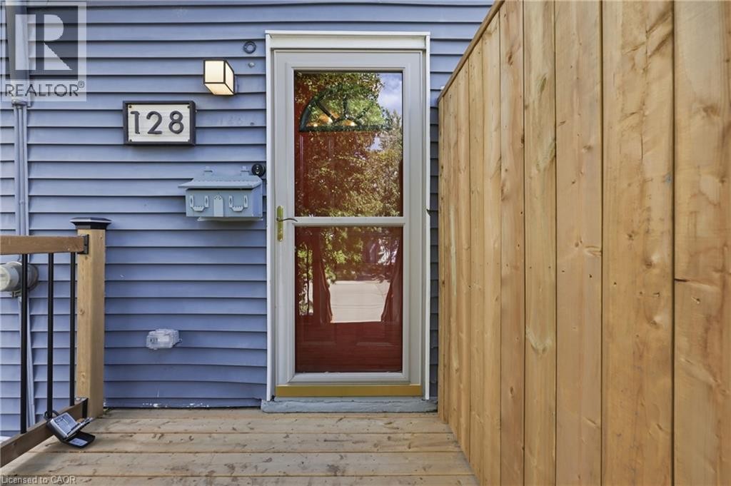 Privacy fence between neighbours. - 128 Robert Street, Hamilton, ON