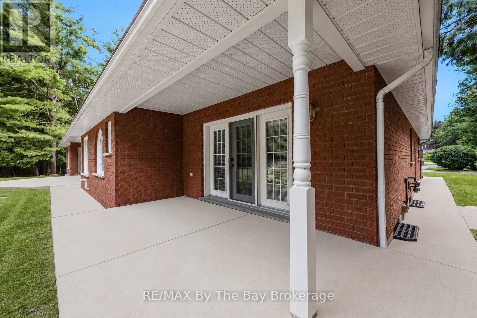Primary Bedroom Rear Doors - 90 Goldfinch Crescent, Tiny, ON