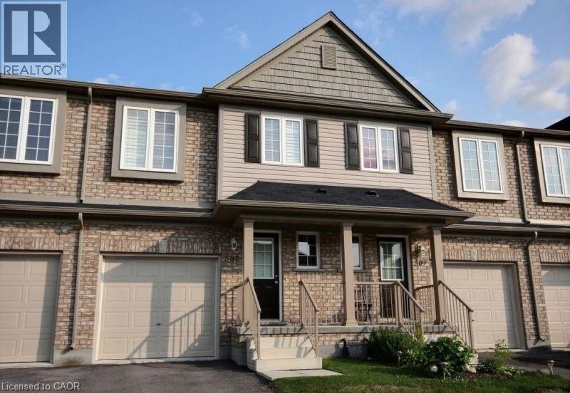 Brick and siding exterior with a peaked roofline - 507 Beaumont Crescent, Kitchener, ON