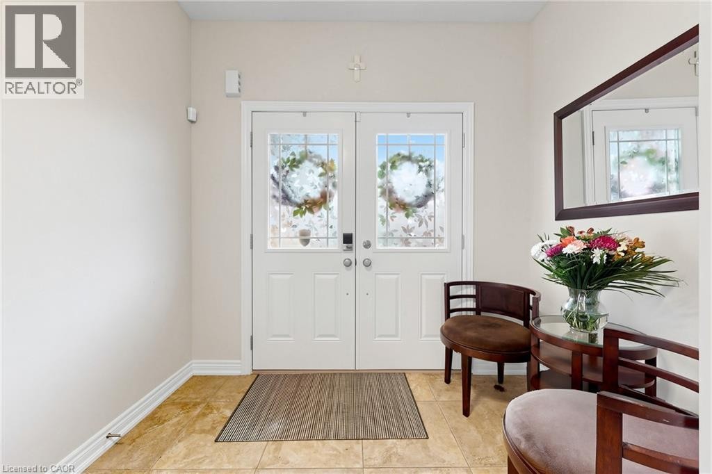 Dual entry doors with decorative glass panels - 173 Raymond Road, Ancaster, ON