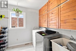 Main Floor Laundry Room + Entry to Garage - 