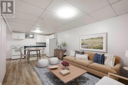 Virtually staged Basement kitchen and living room - 